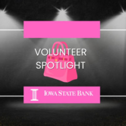 white spotlights on black stage with pink purse