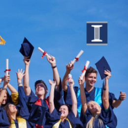 Graduates throwing caps at commencement with bank logo