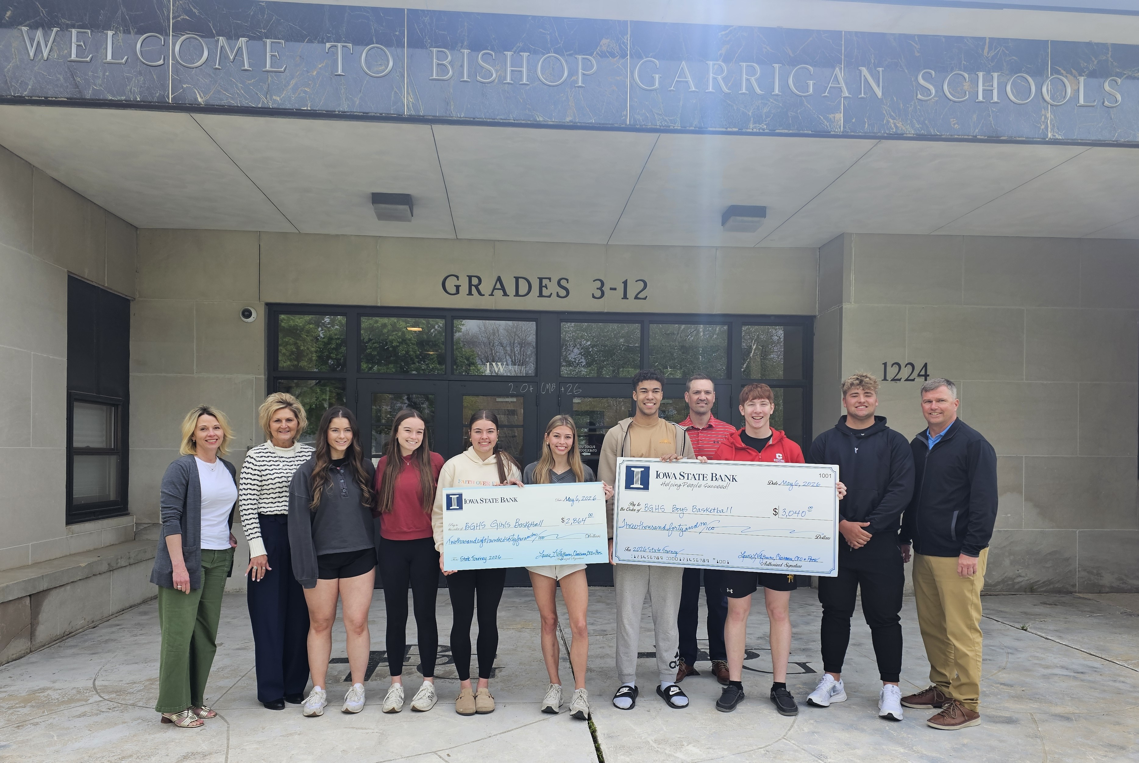 BGHS girls and boys basketball teams receive check from Iowa State Bank