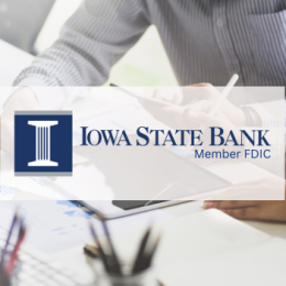 Iowa State Bank logo with man working on computer