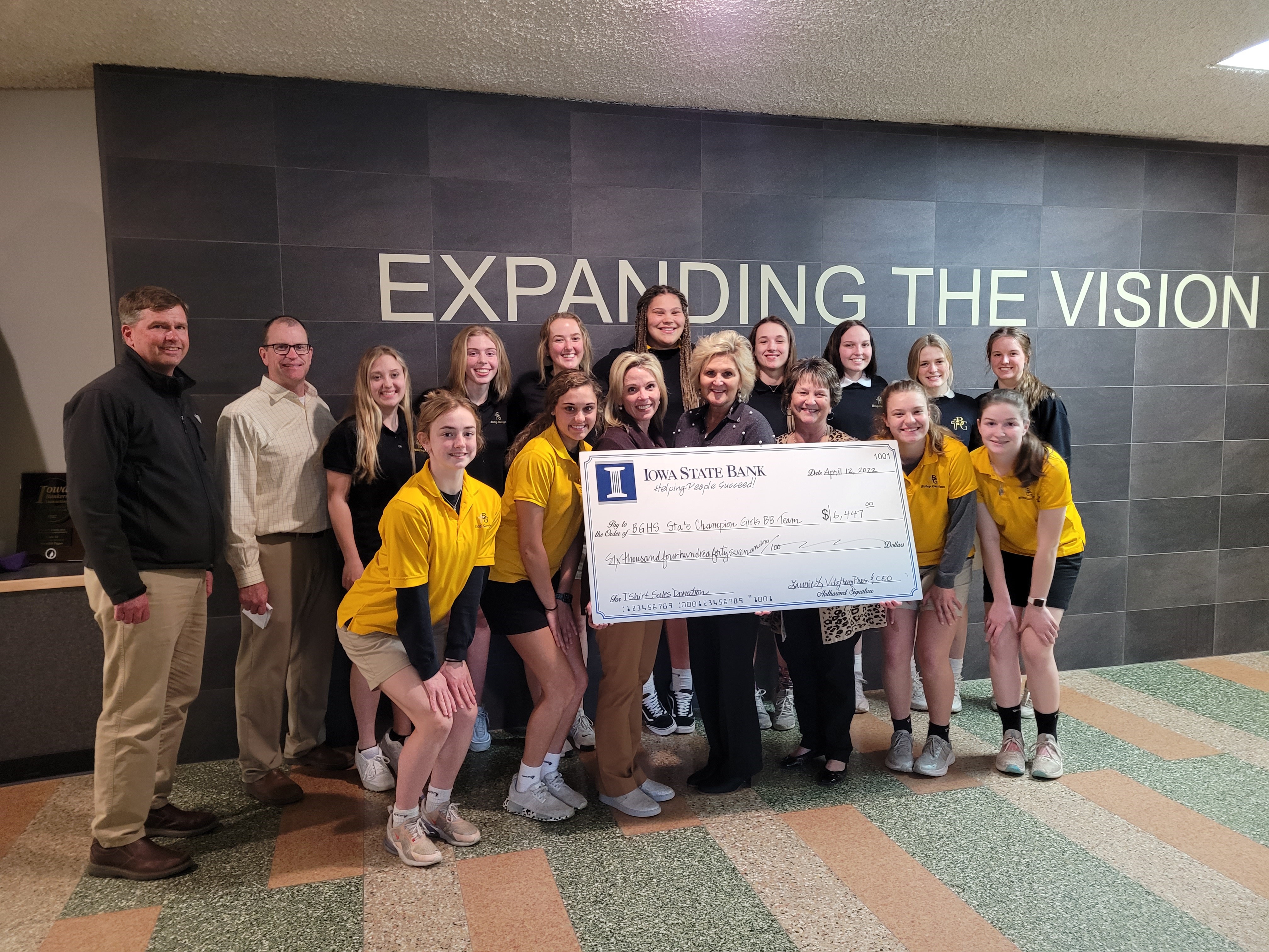 Bank Donation for Bishop Garrigan State Champs