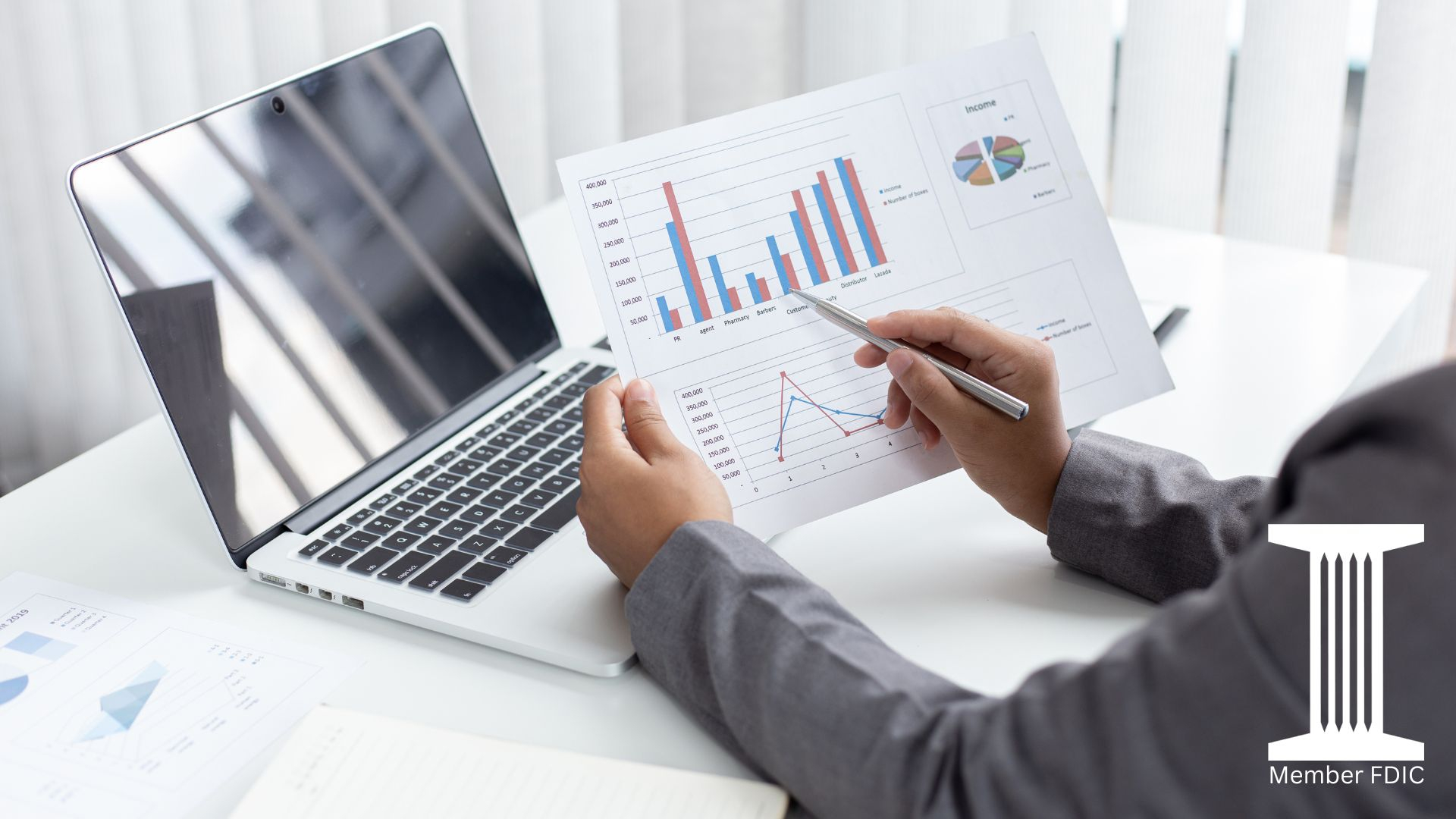 Business banking chart and computer