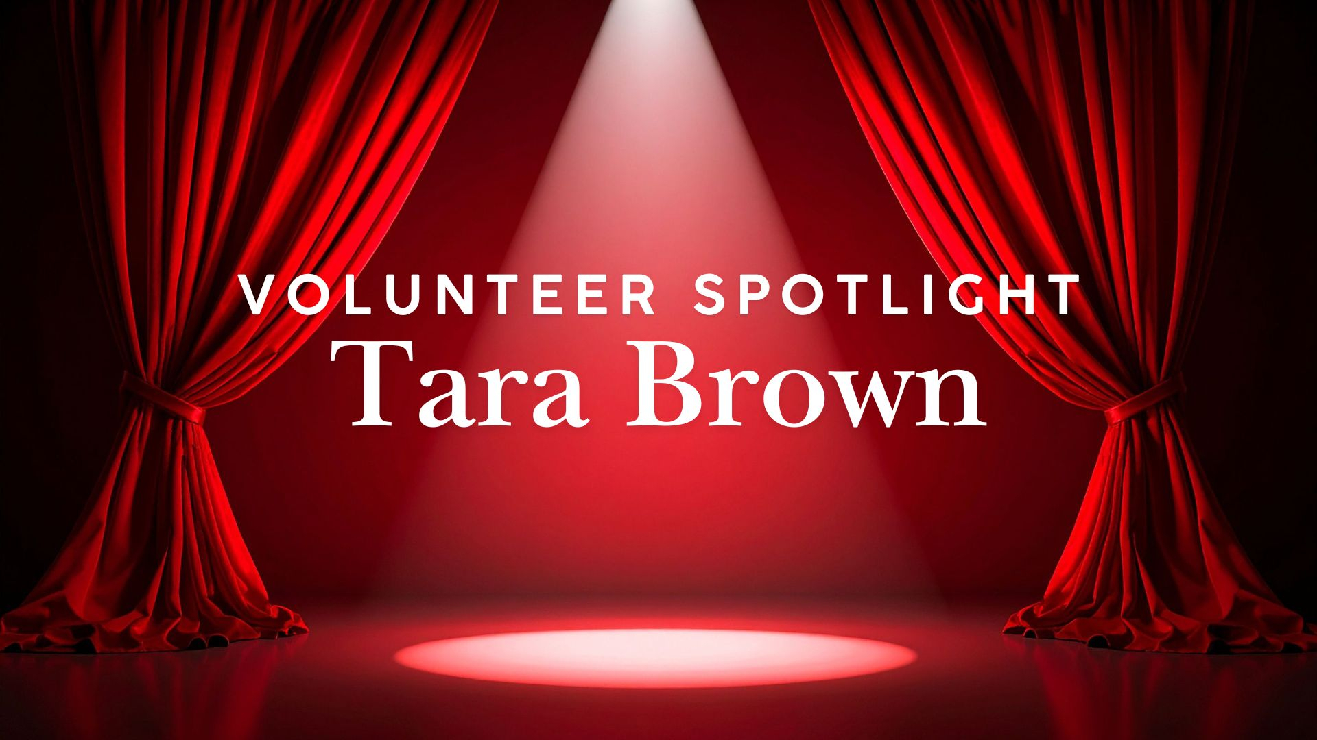 Stage with spotlight on volunteer Tara Brown